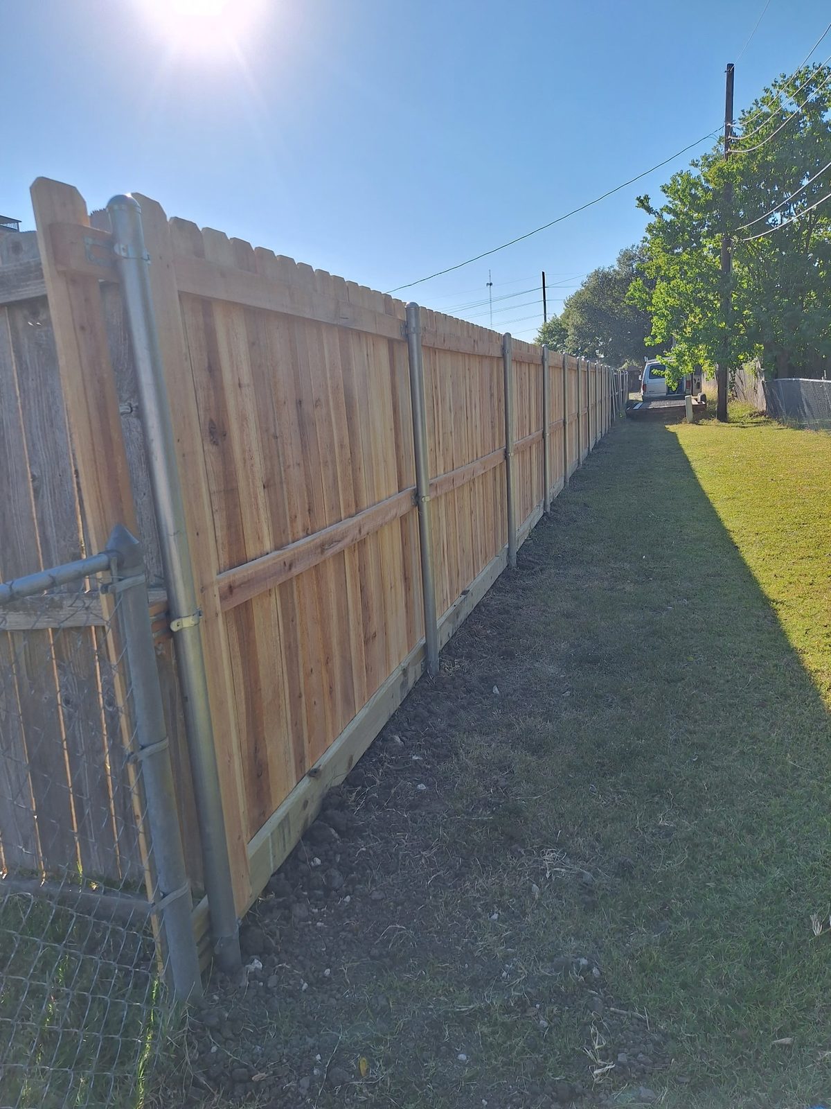 Cedar privacy fence built on galvanized steel posts